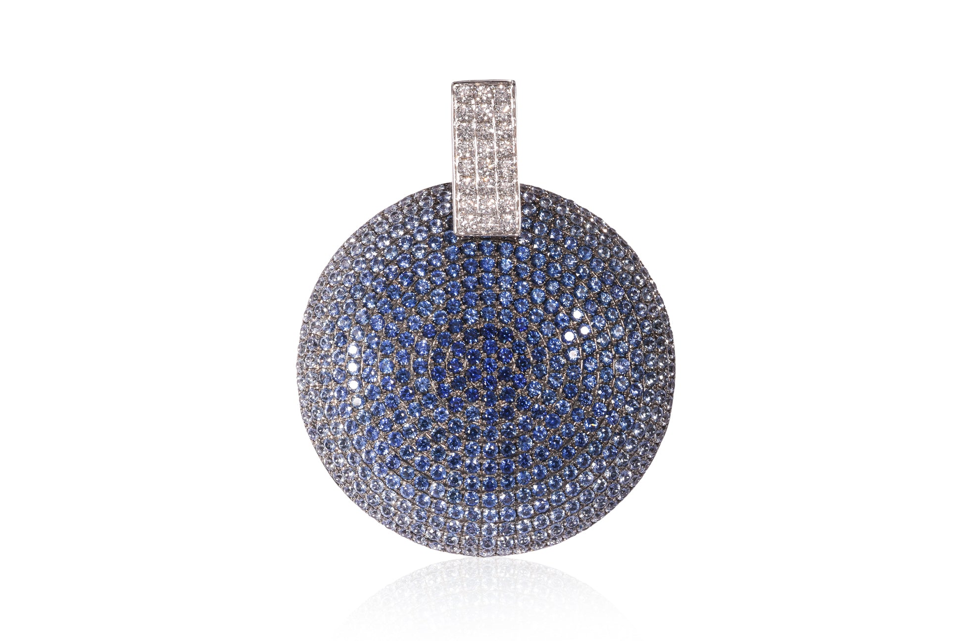 A LARGE SAPPHIRE GRADIENT AND DIAMOND PENDANT