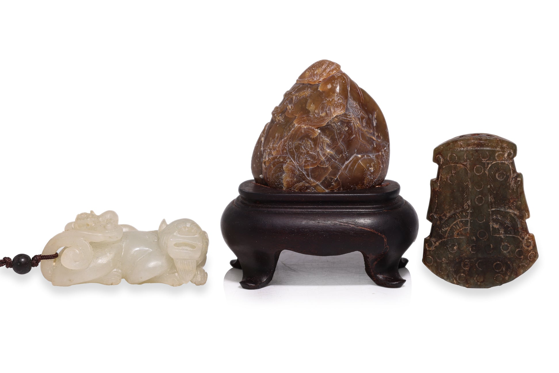 A GROUP OF THREE STONE CARVINGS