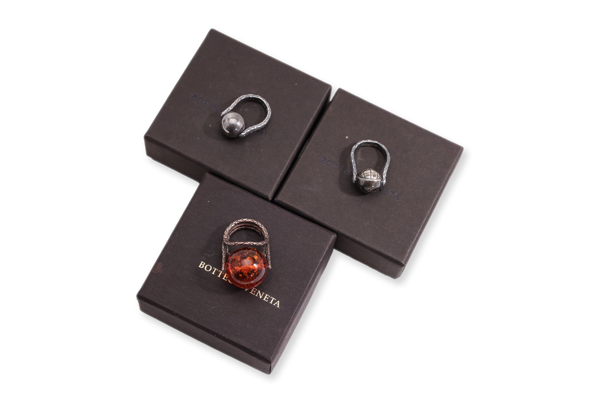 BOTTEGA VENETA - THREE SPINNING SILVER COCKTAIL RINGS