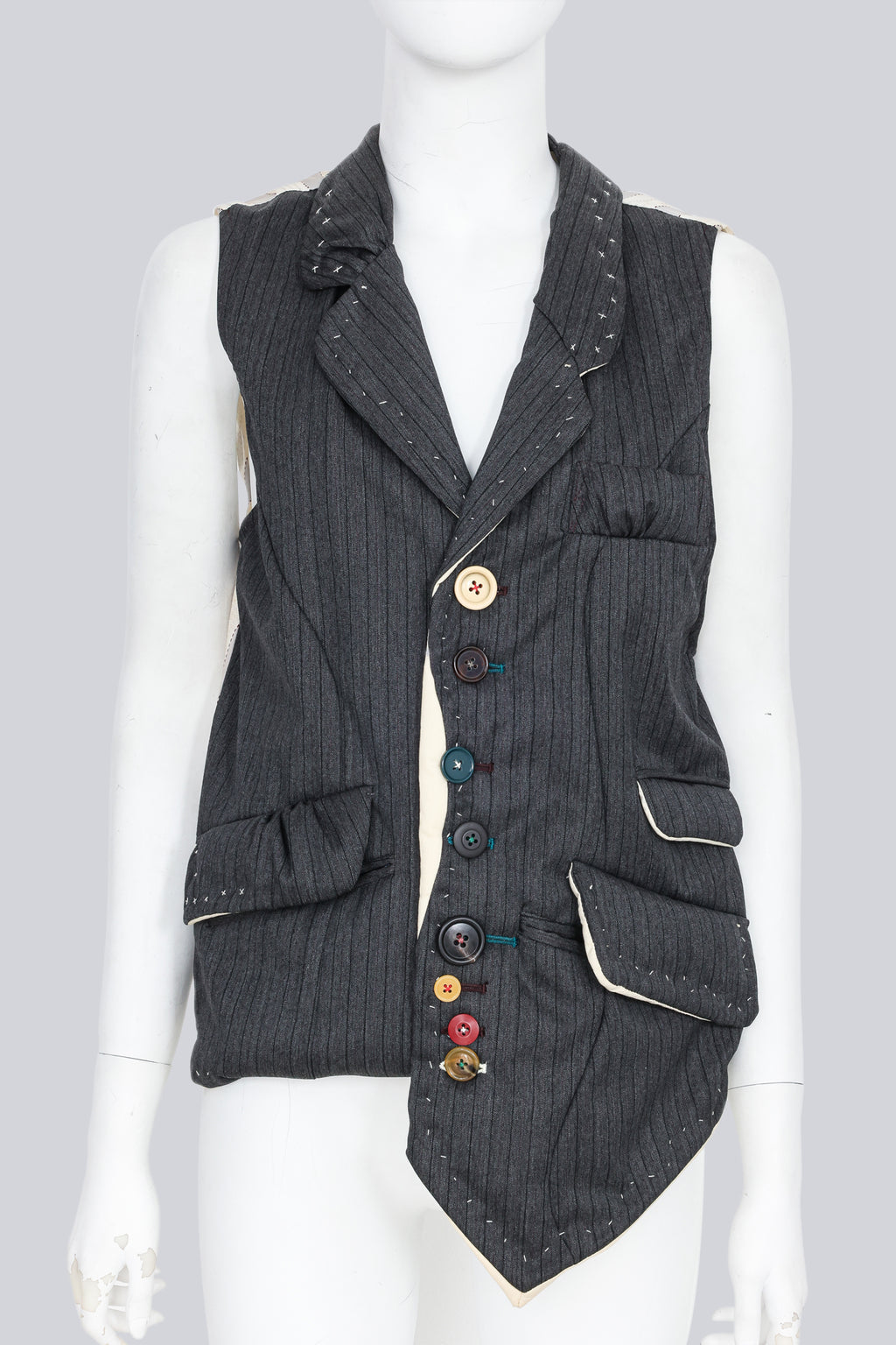 UNDERCOVER JUN TAKAHASHI - AN A/W 2004-2005 SLEEVELESS BLAZER WITH MULTI-COLOURED BUTTONS