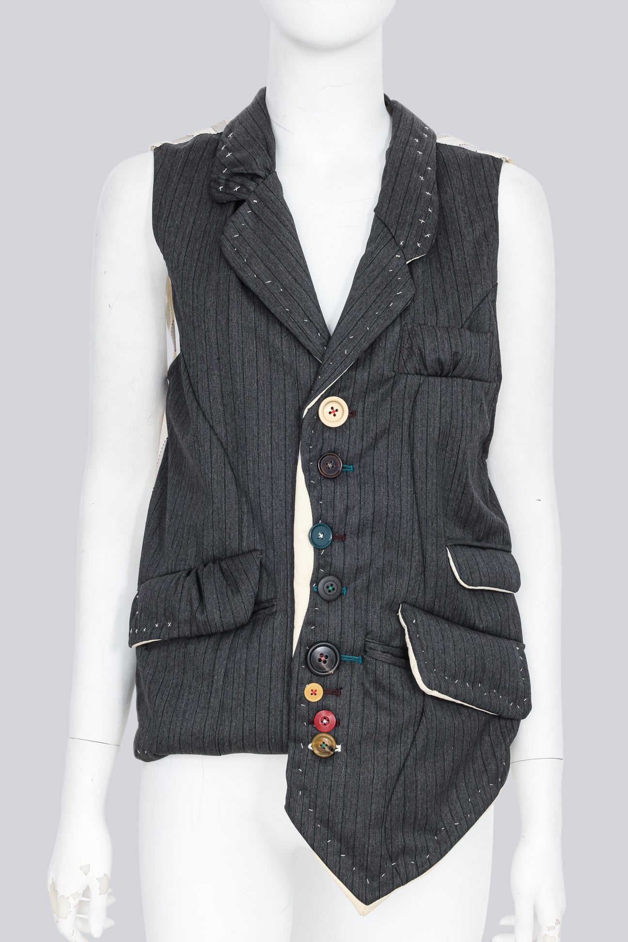 UNDERCOVER JUN TAKAHASHI - AN A/W 2004-2005 SLEEVELESS BLAZER WITH MULTI-COLOURED BUTTONS