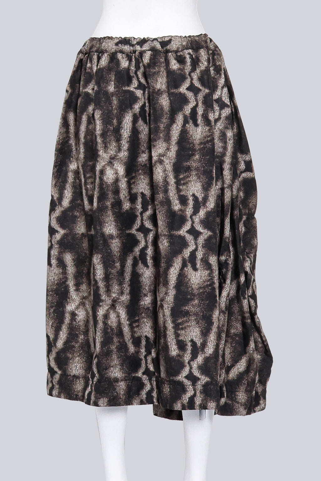 COMME DES GARCONS - A 2015 MUTED BROWN AND BEIGE FUR PRINT SKIRT