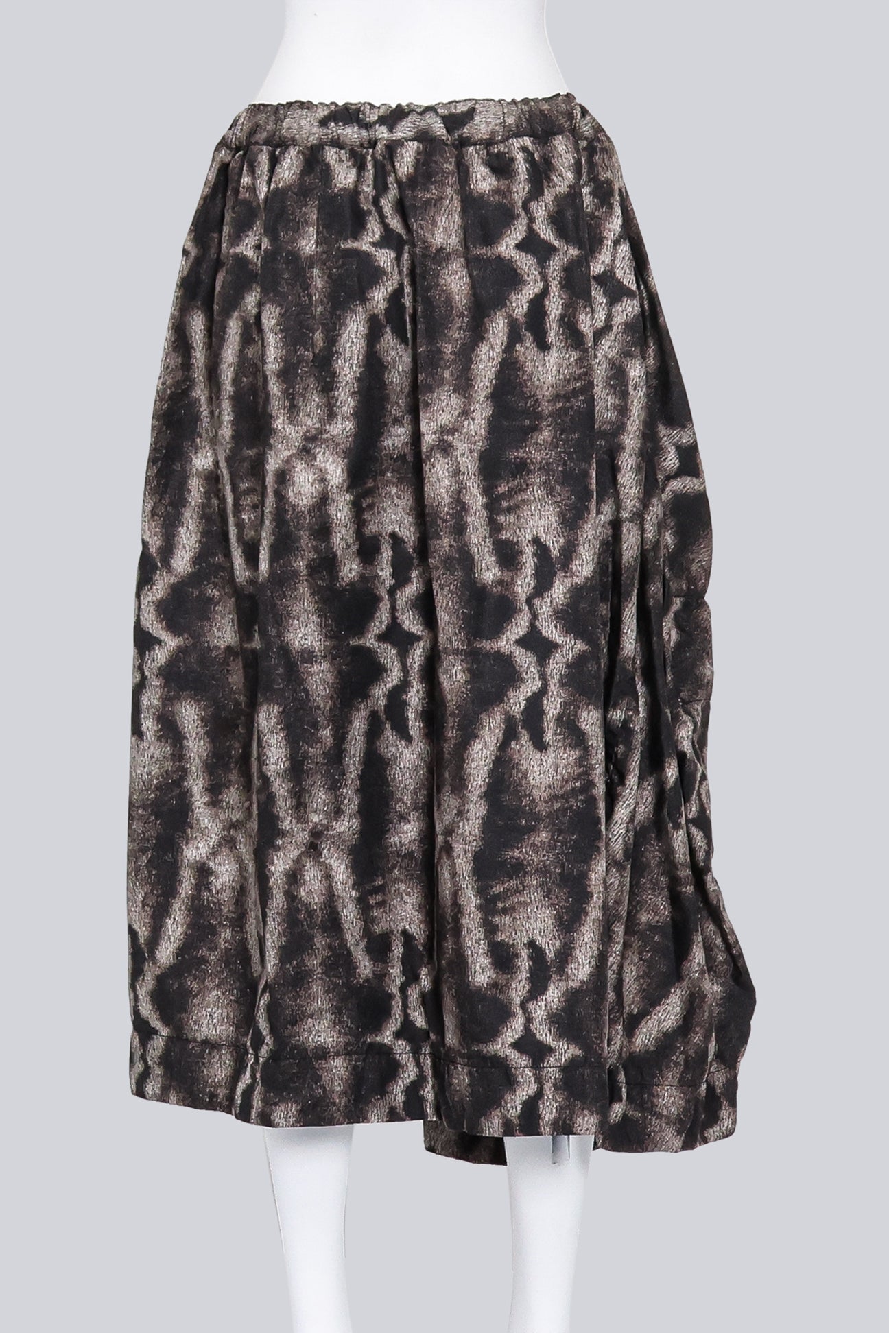 COMME DES GARCONS - A 2015 MUTED BROWN AND BEIGE FUR PRINT SKIRT