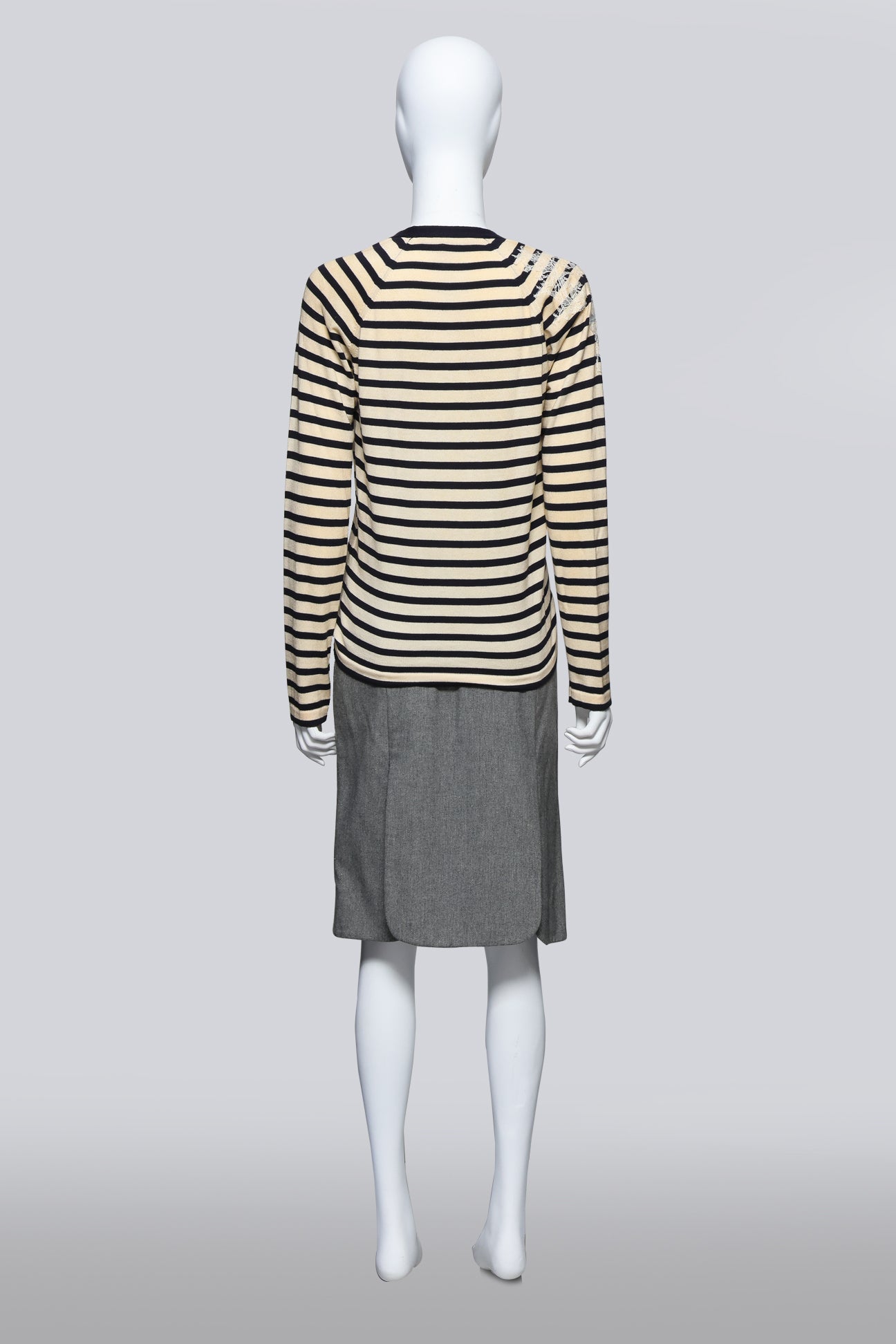 JOHN GALLIANO - A STRIPED CARDIGAN AND GREY SKIRT ENSEMBLE