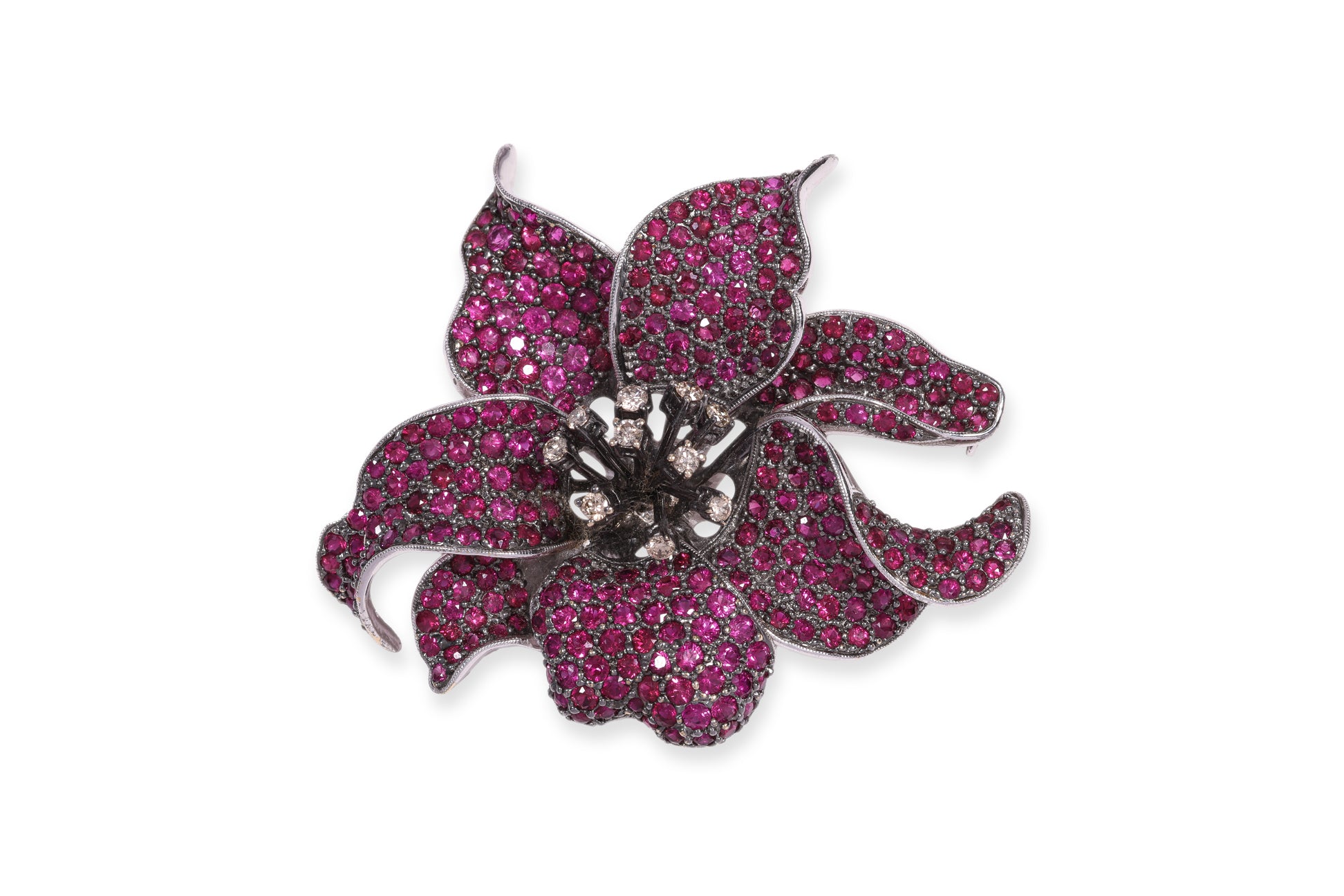 A RUBY AND DIAMOND STYLIZED 'ORCHID' BROOCH