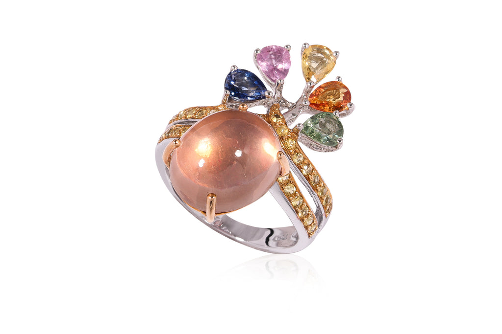 A STAR QUARTZ AND MULTI-COLOUR SAPPHIRE RING