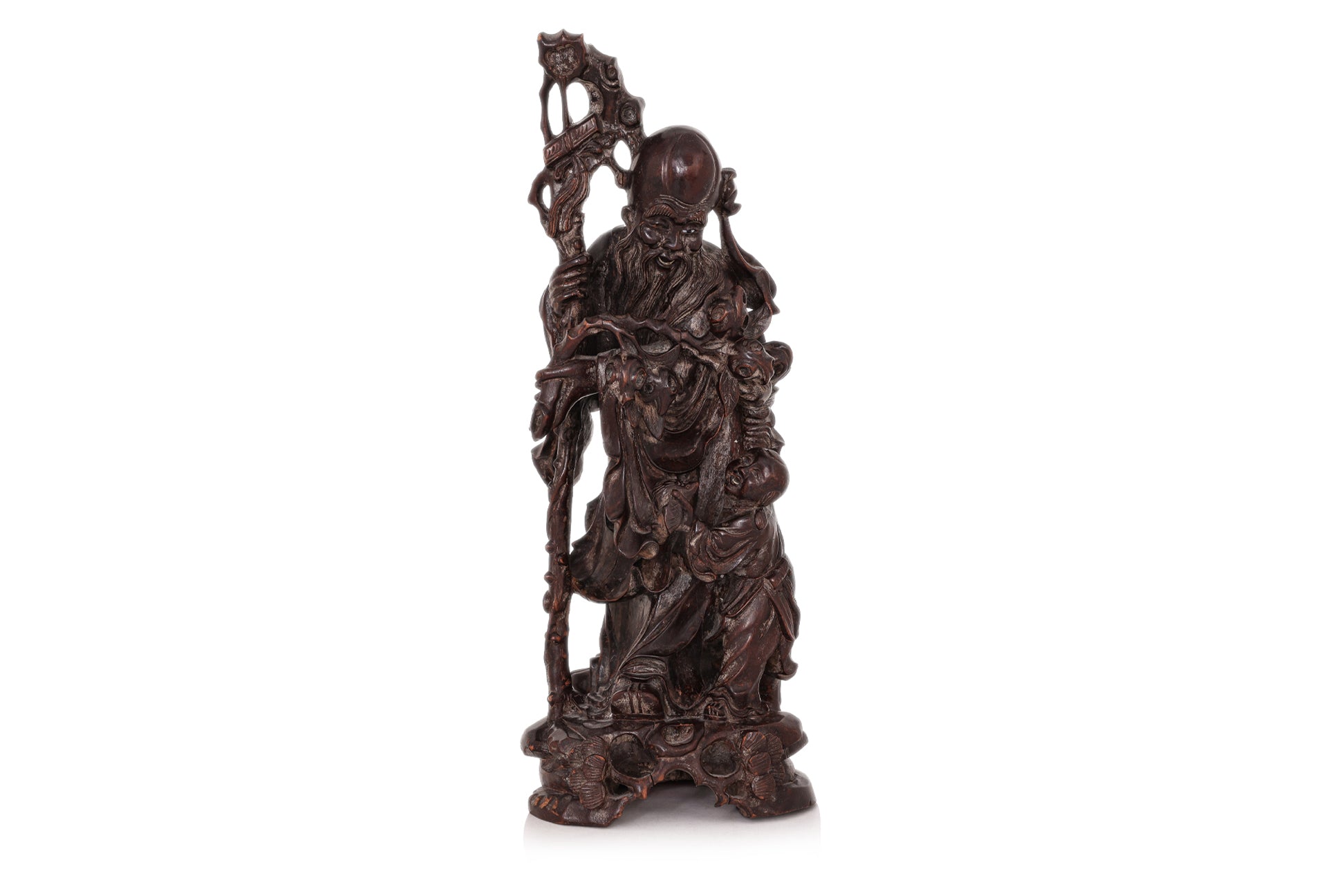 A CARVED HARDWOOD FIGURE OF SHOULAO