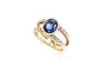 A SAPPHIRE AND DIAMOND RING