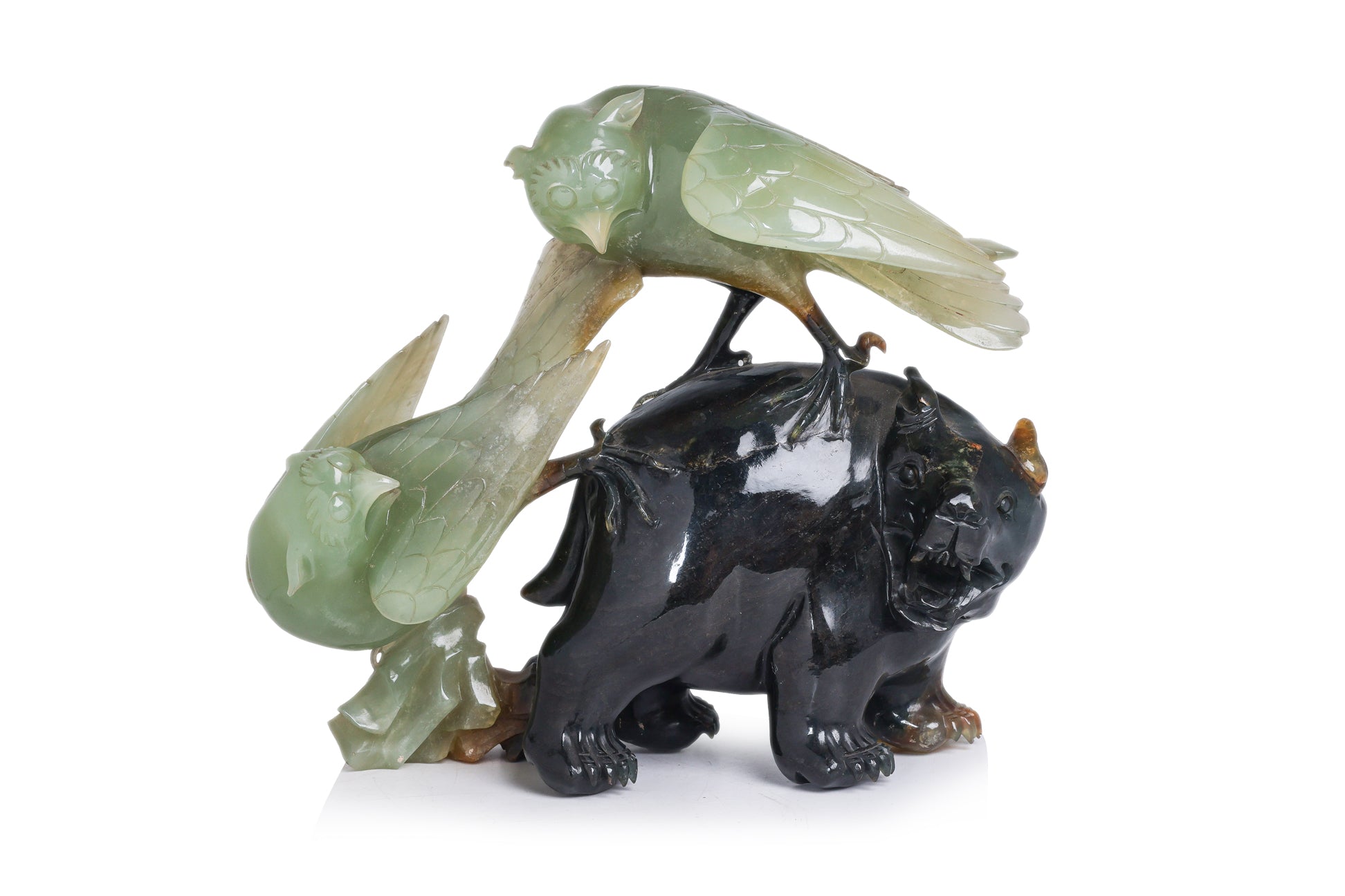 A SERPENTINE JADE BEAR AND BIRDS GROUP