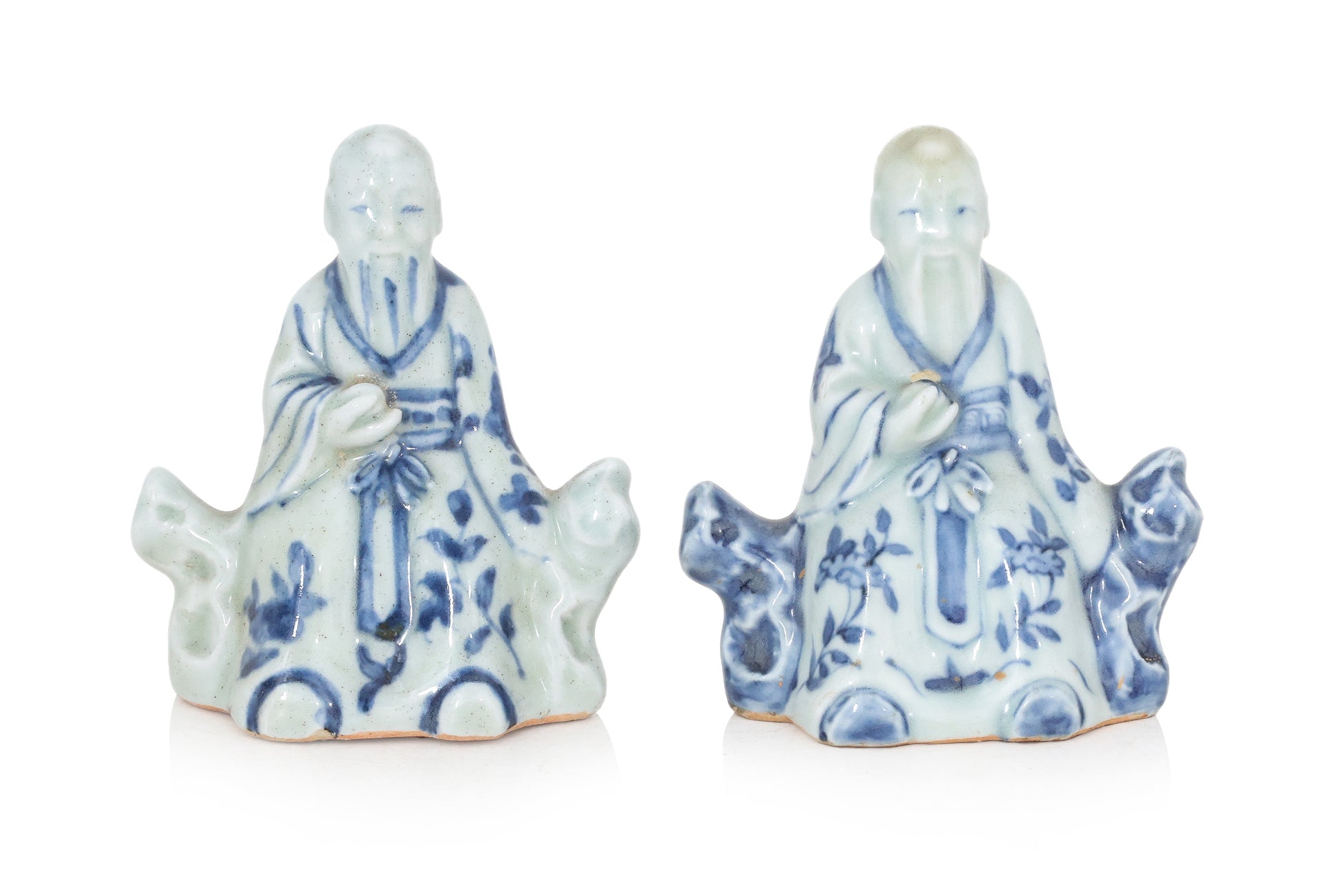 TWO BLUE AND WHITE PORCELAIN FIGURES
