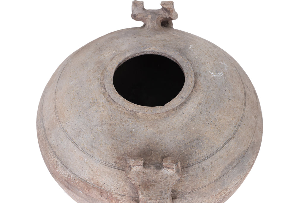 A TWIN HANDLED EARTHENWARE JAR