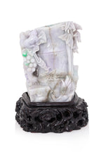 A JADEITE MODEL OF A BAMBOO WITH SQUIRRELS AND GRAPES