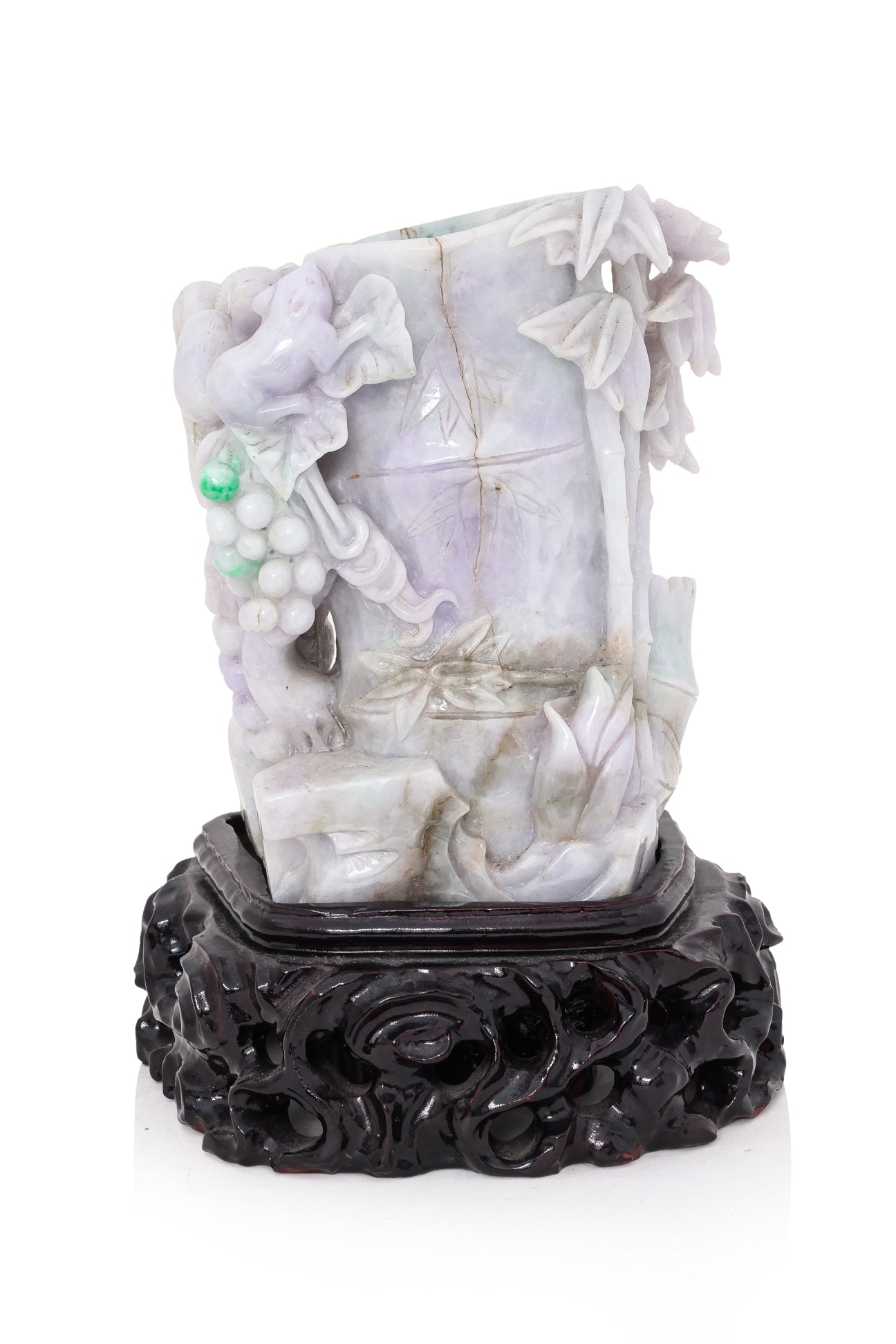 A JADEITE MODEL OF A BAMBOO WITH SQUIRRELS AND GRAPES