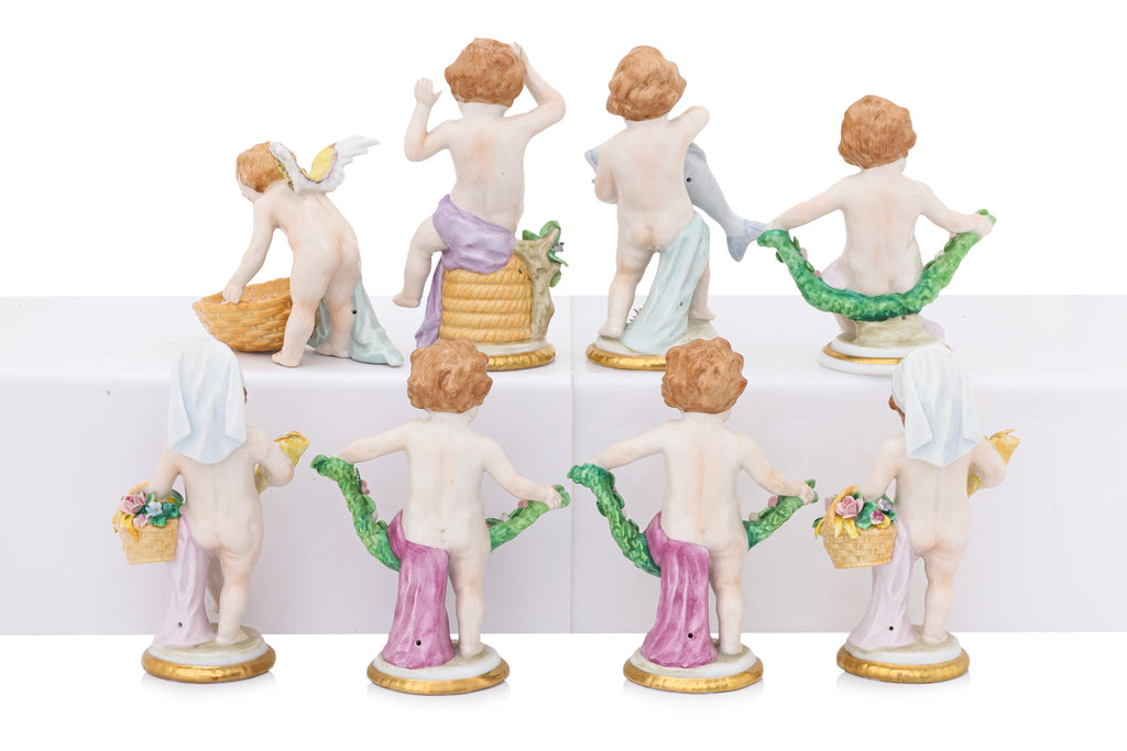 A GROUP OF EIGHT SITZENDORF PORCELAIN FIGURES OF PUTTI