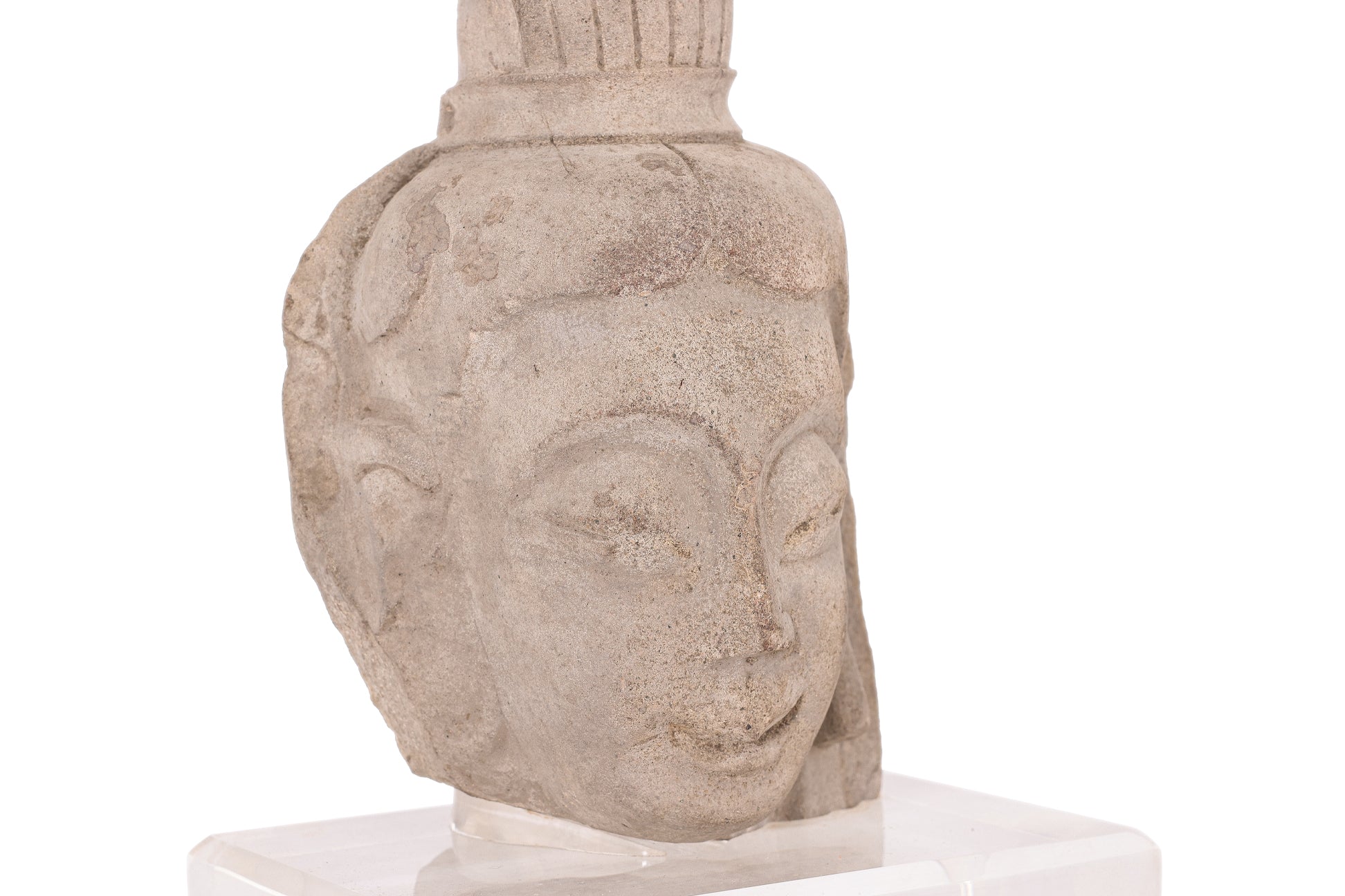 A STONE HEAD OF A BODHISATTVA