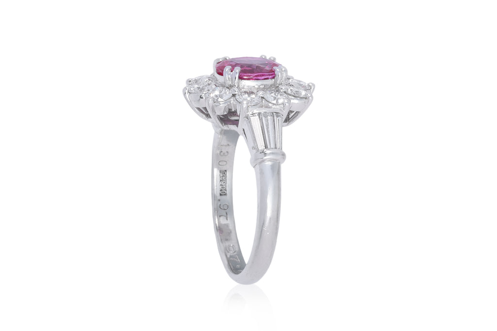 A PINK SAPPHIRE AND DIAMOND CLUSTER RING
