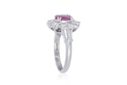 A PINK SAPPHIRE AND DIAMOND CLUSTER RING