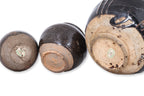 A GROUP OF THREE HENAN BLACK-GLAZED JARS