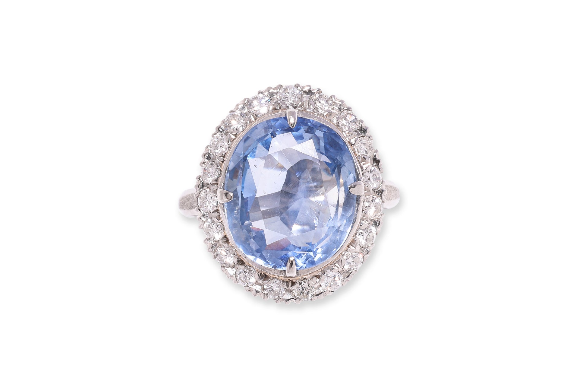 A UNHEATED SAPPHIRE AND DIAMOND 'HALO' RING