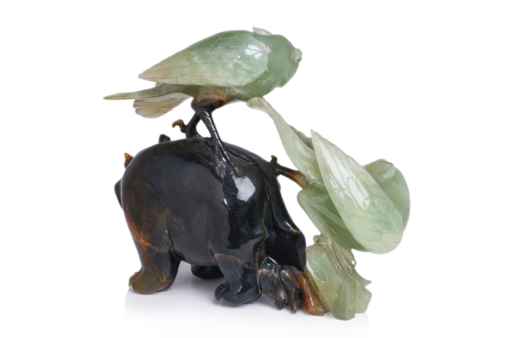 A SERPENTINE JADE BEAR AND BIRDS GROUP