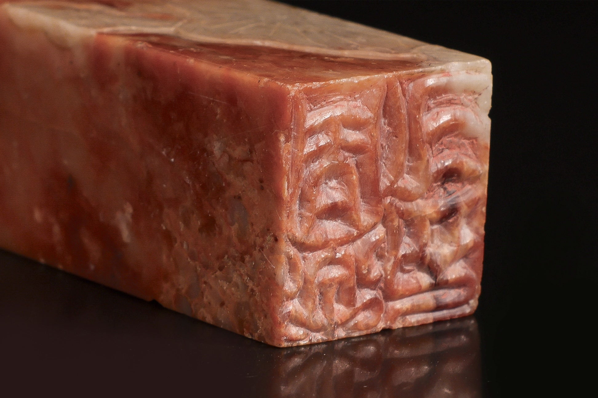 A CARVED SOAPSTONE 'LOTUS' SEAL