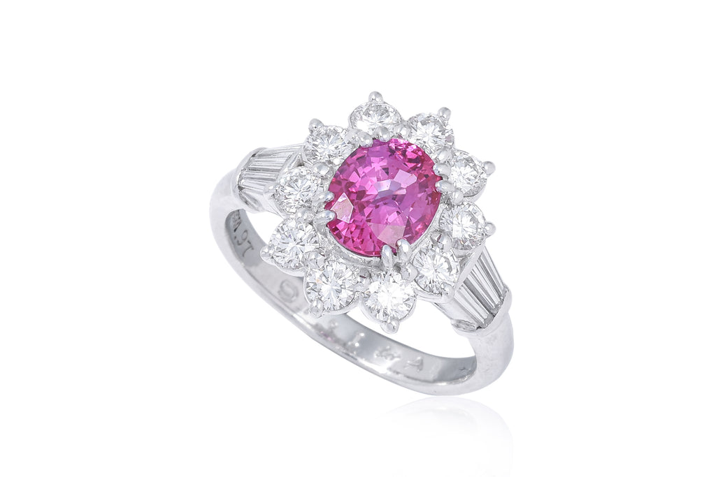 A PINK SAPPHIRE AND DIAMOND CLUSTER RING