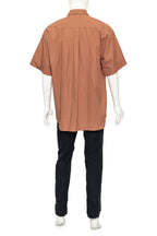 DRIES VAN NOTEN - A BEIGE BUTTON-UP SHIRT AND NAVY TROUSERS ENSEMBLE