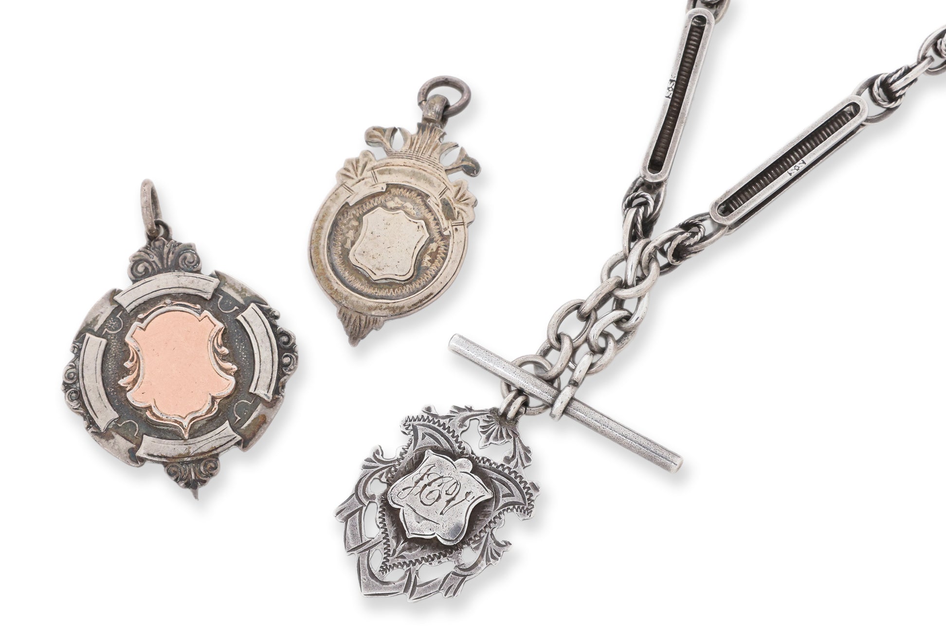 A GROUP OF THREE PIECES OF ANTIQUE SILVER JEWELLERY