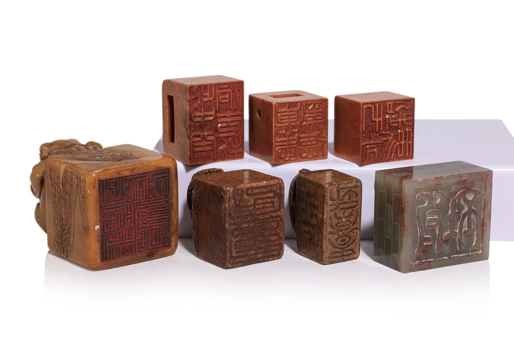 A GROUP OF SEVEN CARVED STONE SEALS