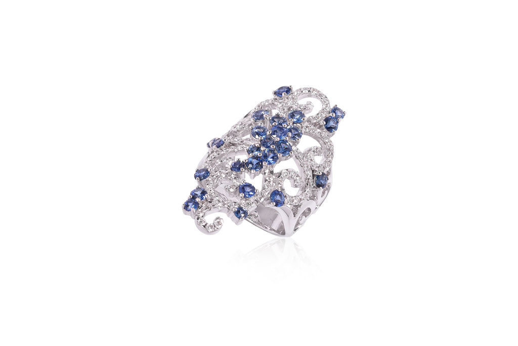 A SAPPHIRE AND DIAMOND RING
