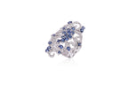 A SAPPHIRE AND DIAMOND RING