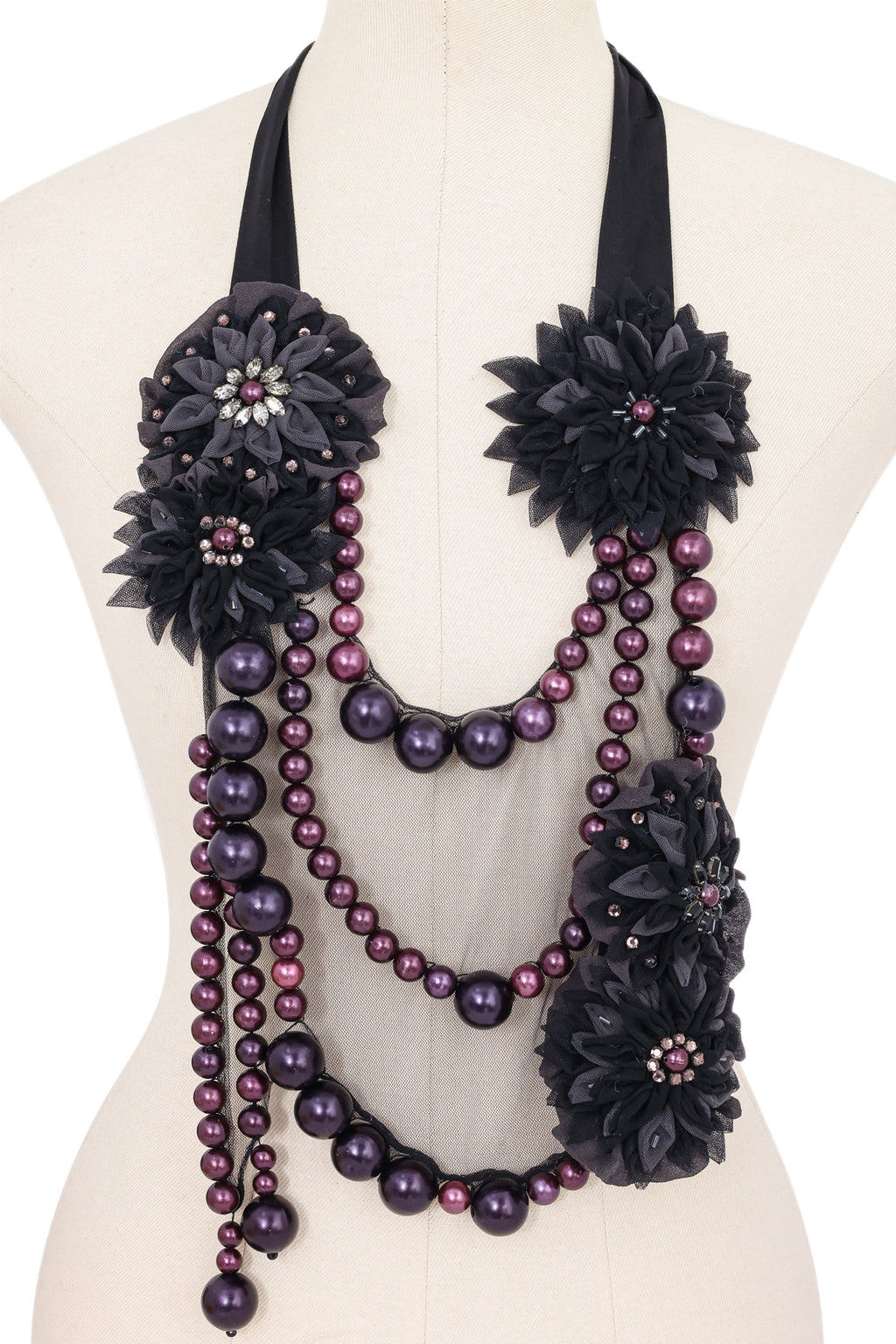 A FENDI FLORAL BROOCH AND AN EMPORIO ARMANI FLORAL STATEMENT NECKLACE