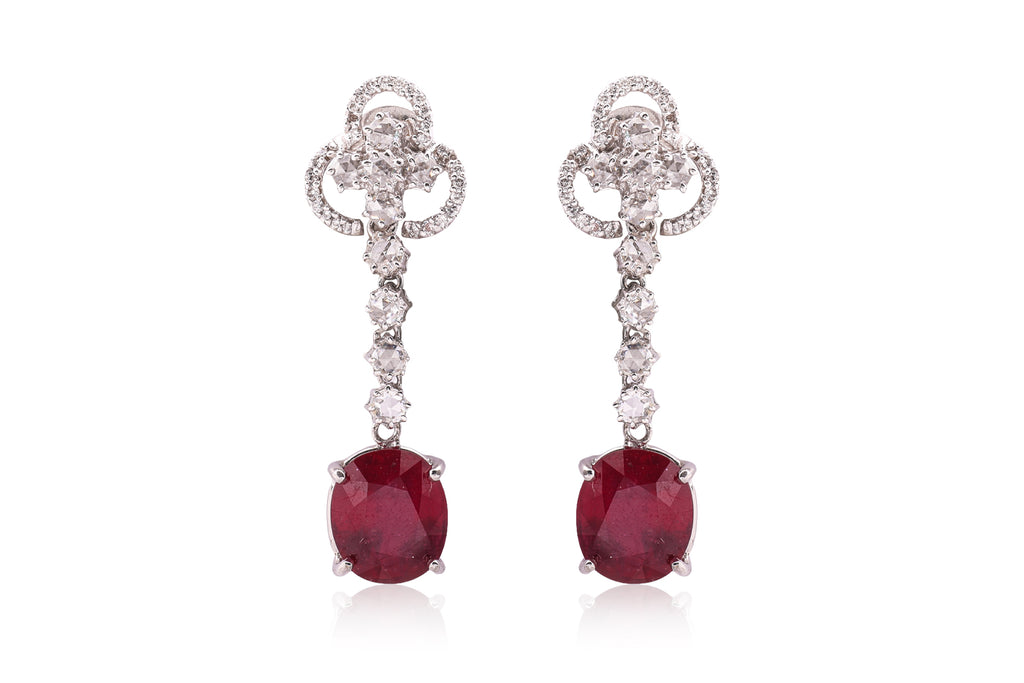 A PAIR OF LEAD GLASS FILLED RUBY AND DIAMOND EARRINGS