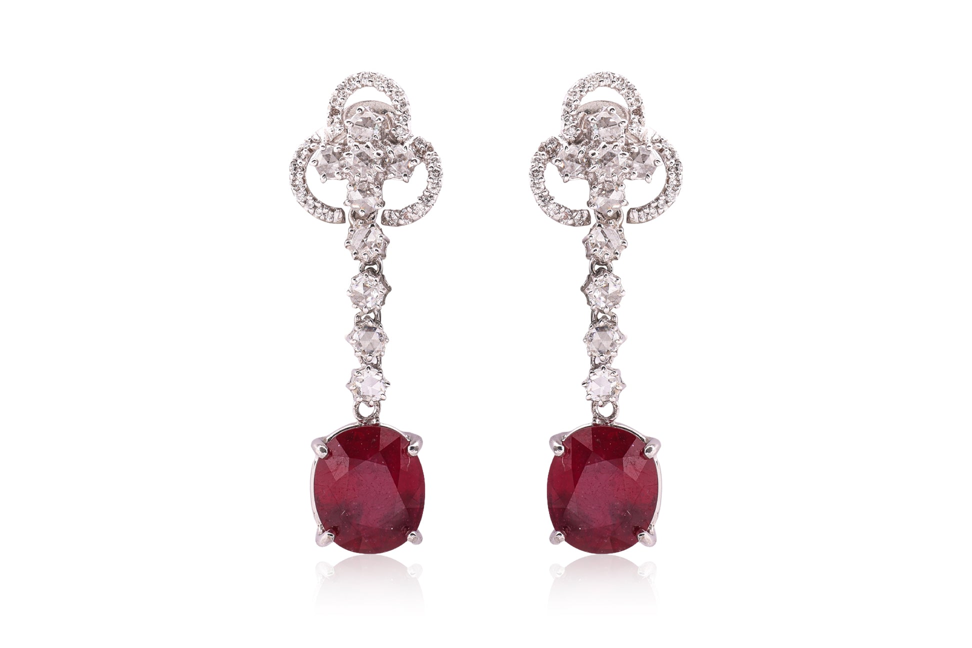 A PAIR OF LEAD GLASS FILLED RUBY AND DIAMOND EARRINGS