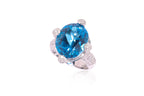 A BLUE TOPAZ AND DIAMOND RING