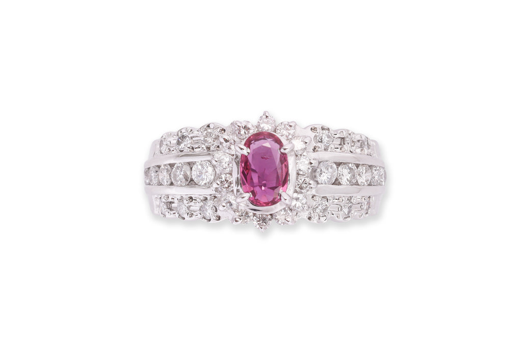A RUBY AND DIAMOND CLUSTER RING
