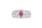 A RUBY AND DIAMOND CLUSTER RING