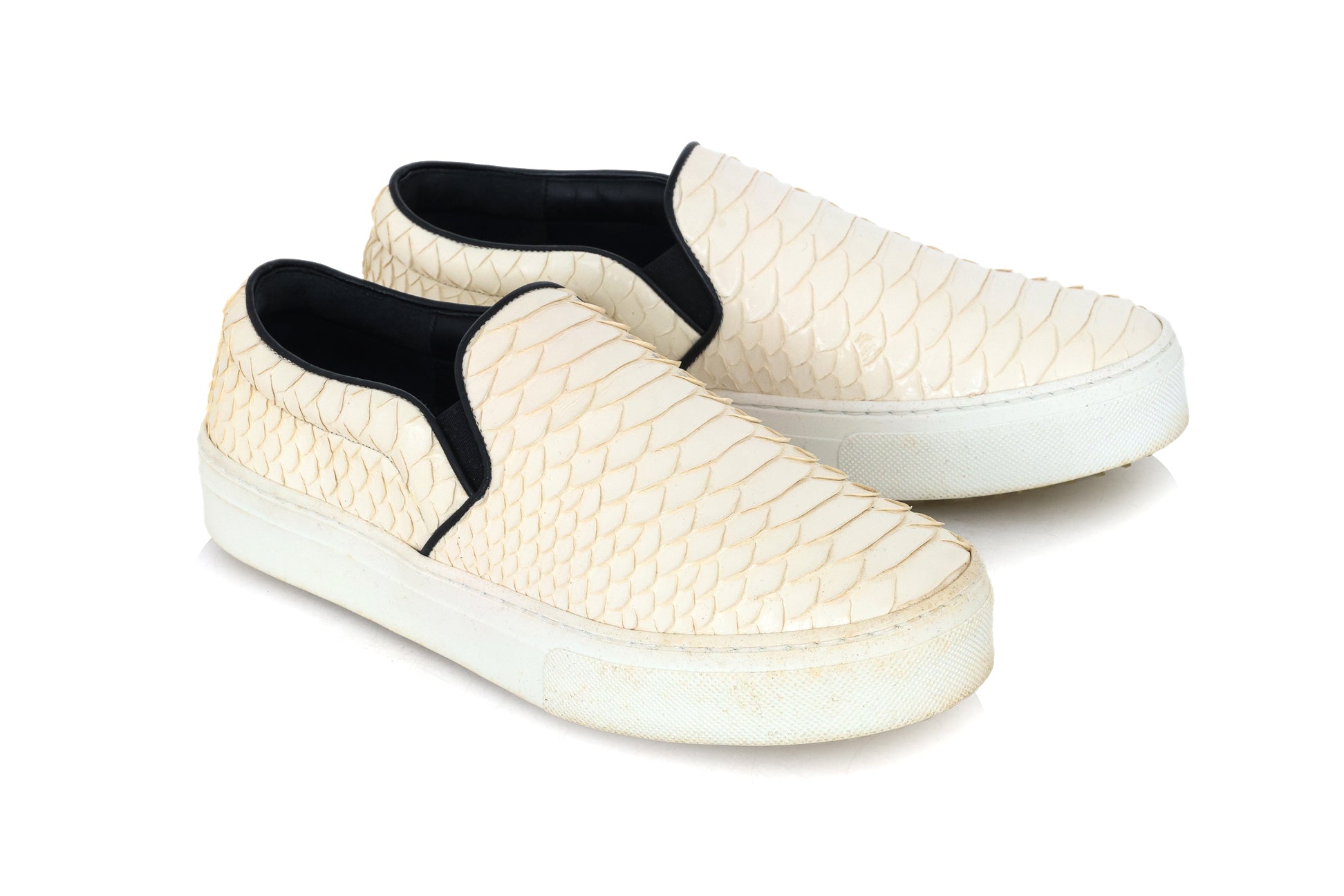 CELINE – A PAIR OF WHITE PYTHON SLIP-ON SNEAKERS