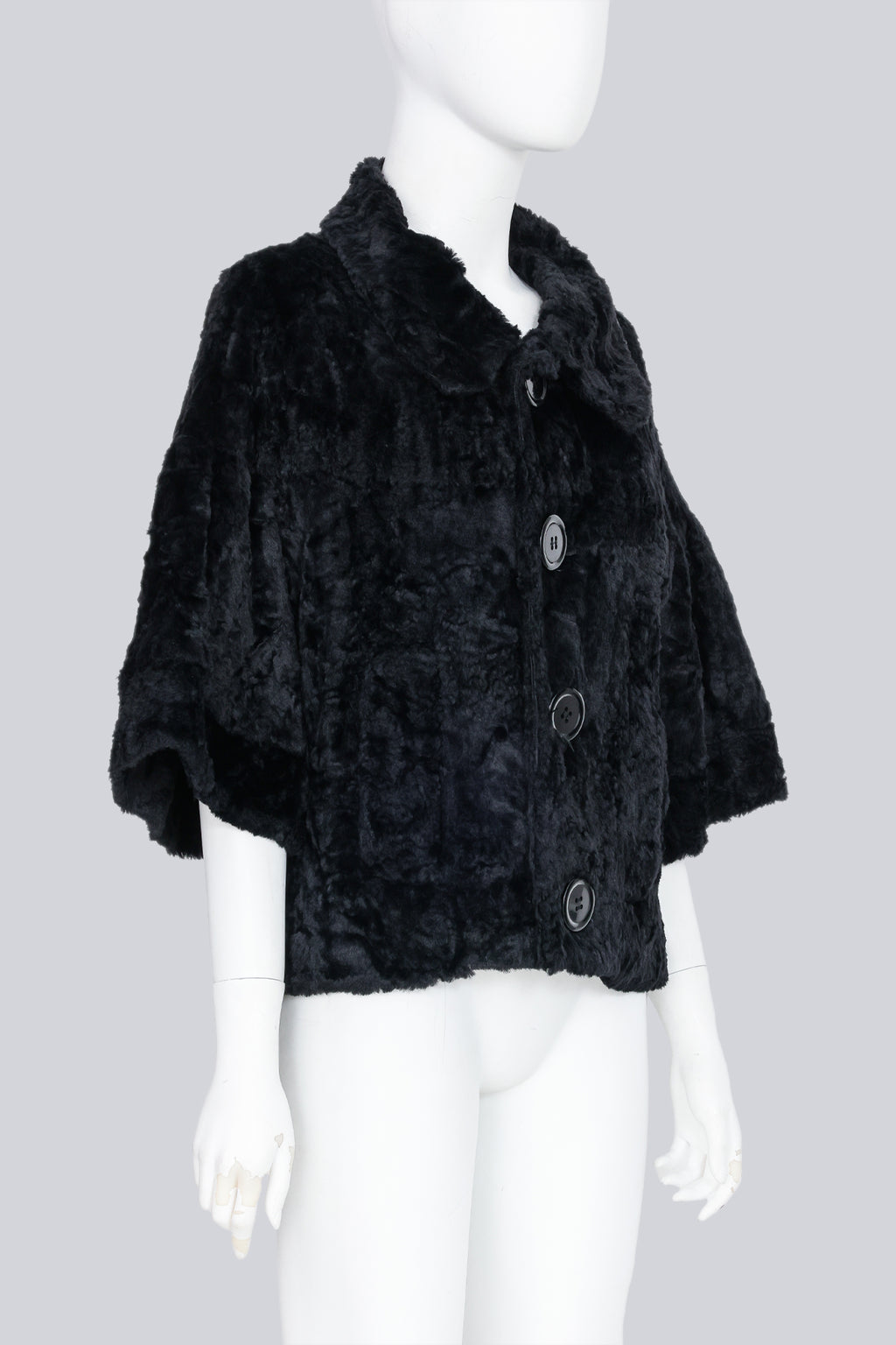 LIMI FEU - A BLACK FAUX FUR JACKET WITH OVERSIZED BUTTONS