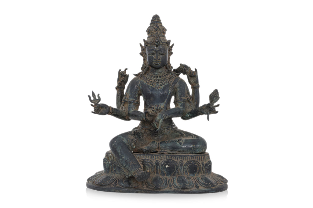 A BRONZE MODEL OF SEATED SHIVA