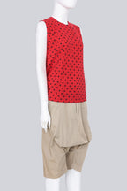 COMME DES GARCONS - A 2011 RED POLKA DOT SLEEVELESS SHIRT AND TAN DROP CROTCH CULOTTES ENSEMBLE