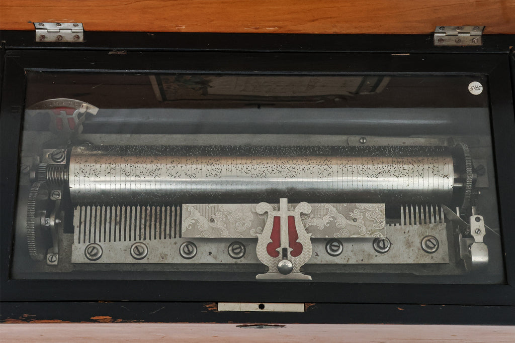 A SWISS CYLINDER MUSIC BOX