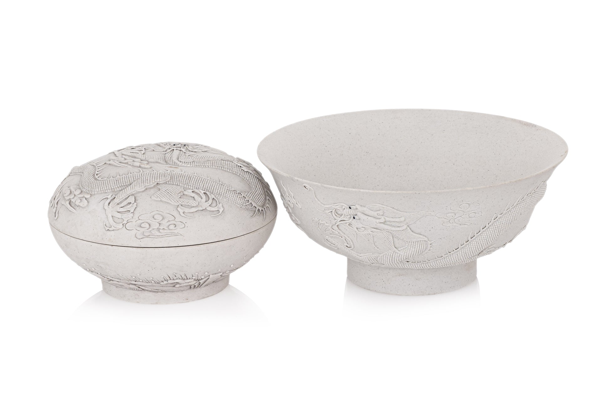 A CARVED BISCUIT PORCELAIN BOWL AND CIRCULAR BOX