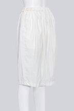 COMME DES GARCONS - A PAIR OF 2015 WHITE BERMUDA SHORTS