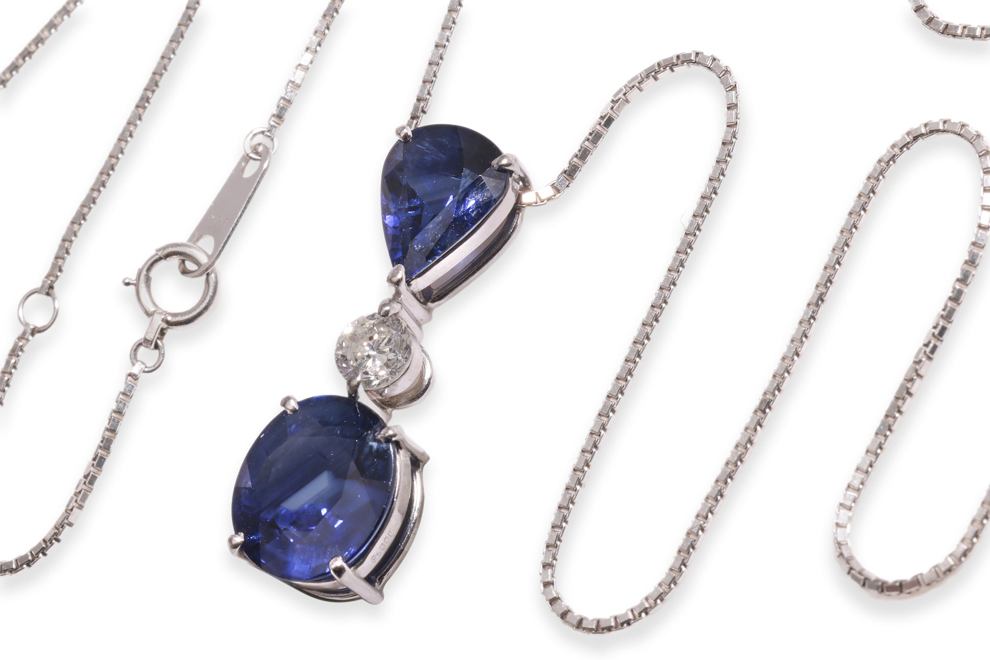 A BLUE SAPPHIRE AND DIAMOND PENDANT ON CHAIN