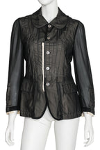 COMME DES GARÇONS - A SHEER PADDED COAT