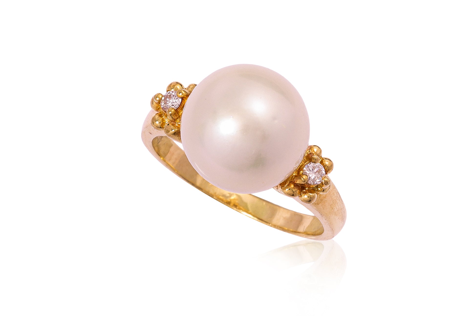 A CULTURED PEARL AND DIAMOND RING