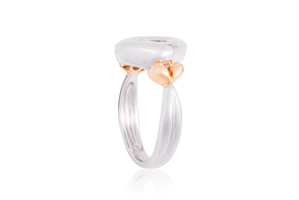 A DIAMOND SET TWO-TONE RING