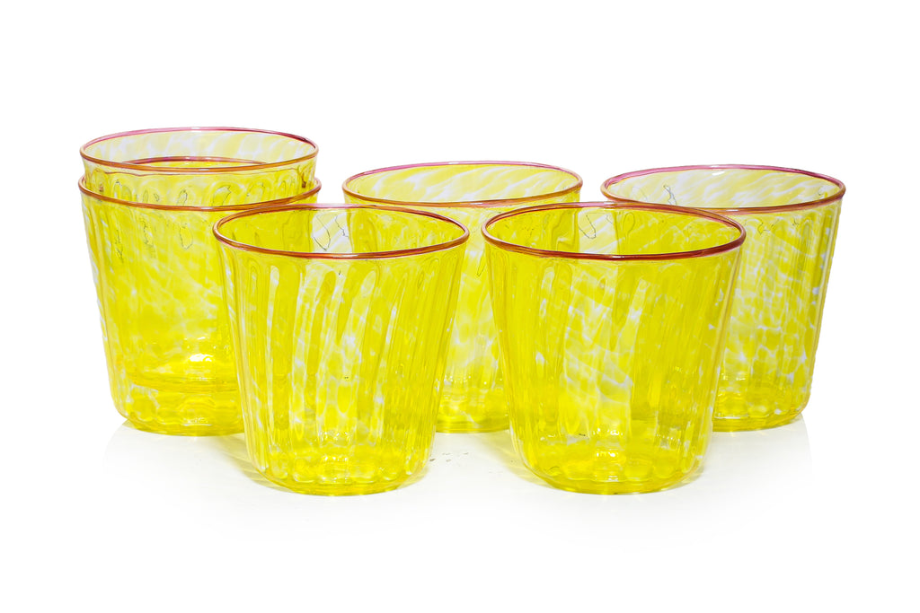 A GROUP OF SIX YELLOW GLASS TUMBLERS