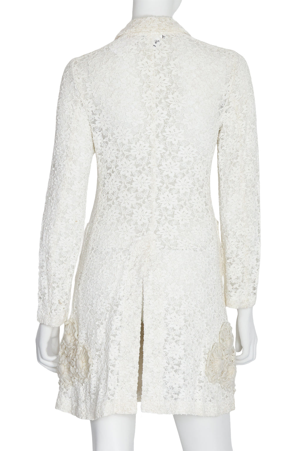 COMME DES GARÇONS - A LACE COAT WITH APPLIQUÉ KNITTED FLORAL MOTIF, 2011